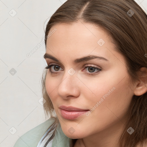 Neutral white young-adult female with long  brown hair and brown eyes