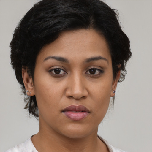 Neutral latino young-adult female with short  black hair and brown eyes