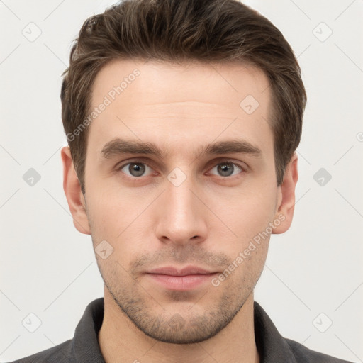 Neutral white young-adult male with short  brown hair and grey eyes