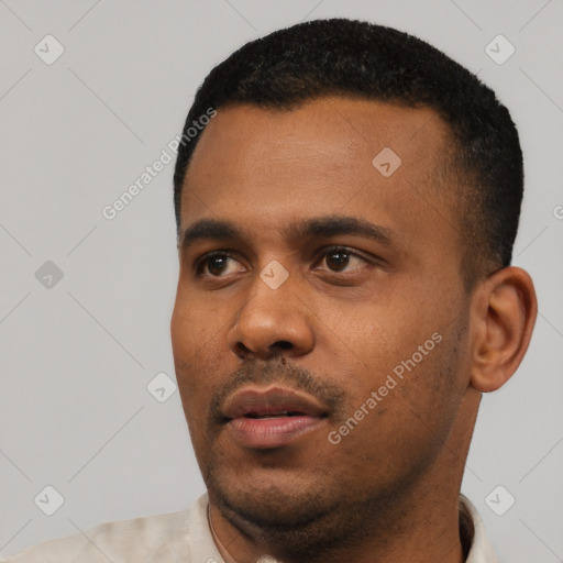 Neutral latino young-adult male with short  black hair and brown eyes
