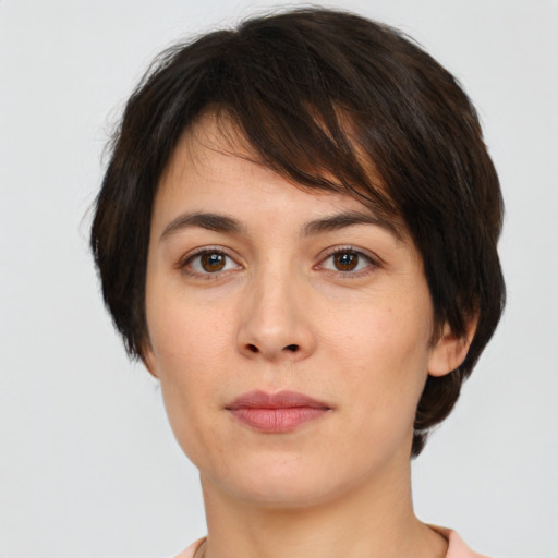 Neutral white young-adult female with short  brown hair and brown eyes