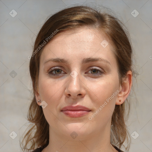 Joyful white young-adult female with medium  brown hair and blue eyes