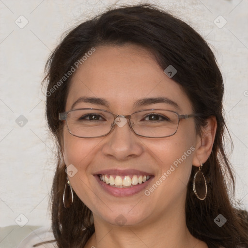 Joyful white adult female with long  brown hair and brown eyes