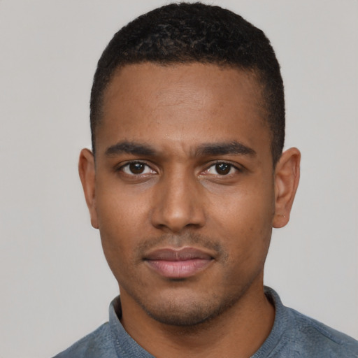 Neutral black young-adult male with short  black hair and brown eyes