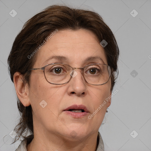 Neutral white middle-aged female with medium  brown hair and grey eyes