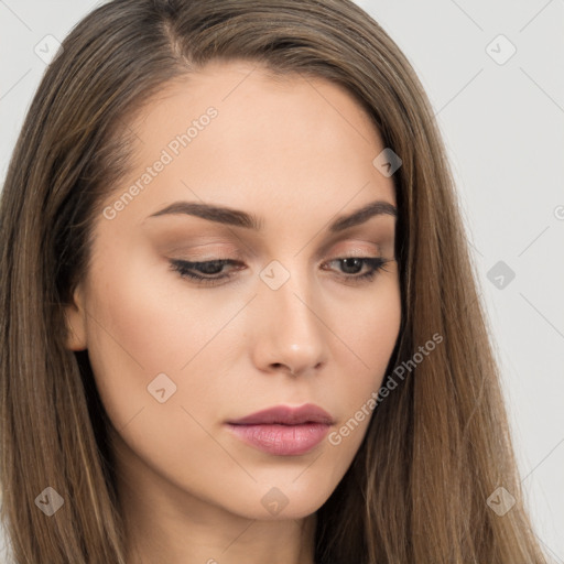 Neutral white young-adult female with long  brown hair and brown eyes