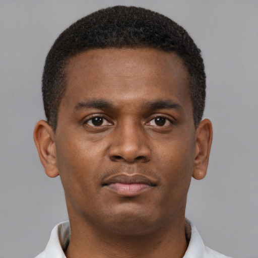 Neutral black young-adult male with short  brown hair and brown eyes