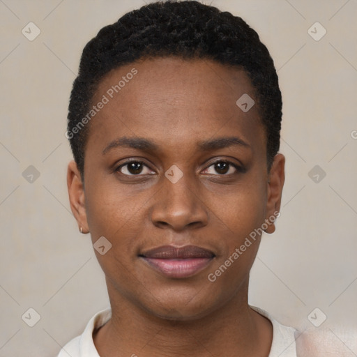 Joyful black young-adult female with short  black hair and brown eyes