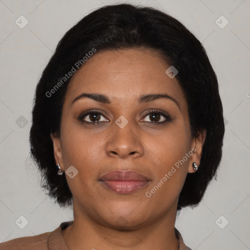 Joyful black young-adult female with medium  brown hair and brown eyes