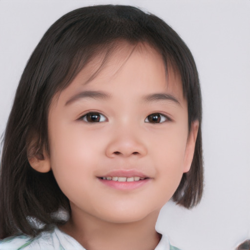 Joyful asian child female with medium  brown hair and brown eyes