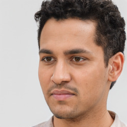Neutral white young-adult male with short  black hair and brown eyes