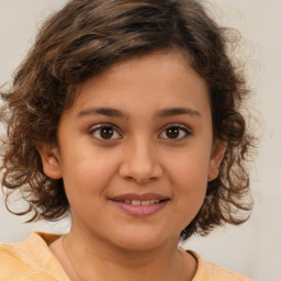 Joyful white child female with medium  brown hair and brown eyes