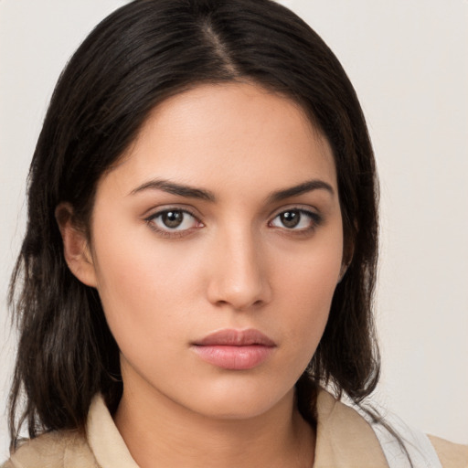 Neutral white young-adult female with medium  brown hair and brown eyes