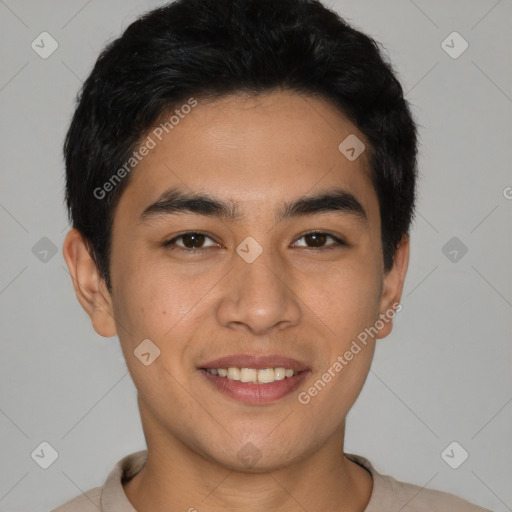 Joyful white young-adult male with short  black hair and brown eyes