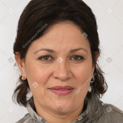 Joyful white adult female with medium  brown hair and brown eyes