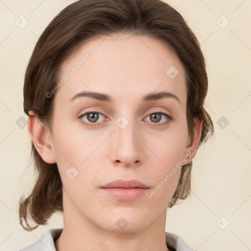 Neutral white young-adult female with medium  brown hair and grey eyes