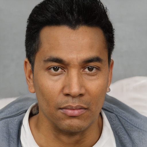 Neutral asian young-adult male with short  black hair and brown eyes