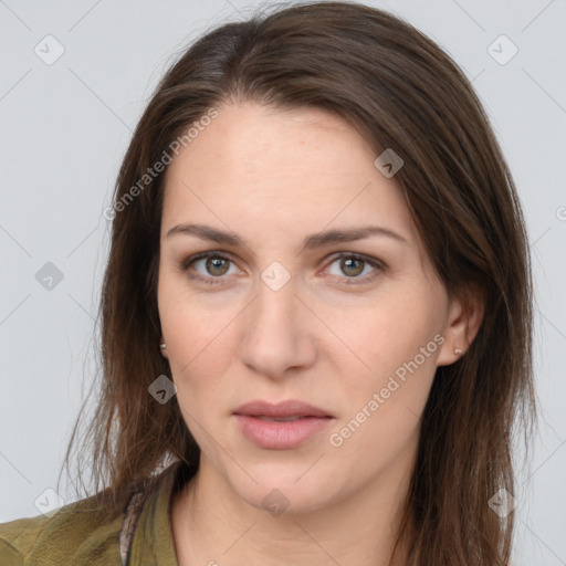 Joyful white young-adult female with long  brown hair and grey eyes