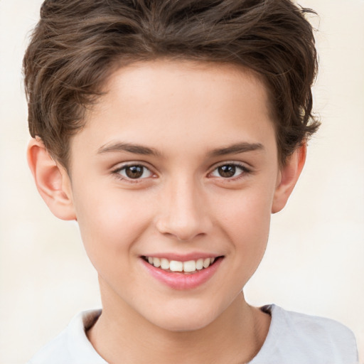 Joyful white child female with short  brown hair and brown eyes