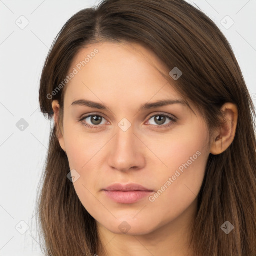 Neutral white young-adult female with long  brown hair and brown eyes