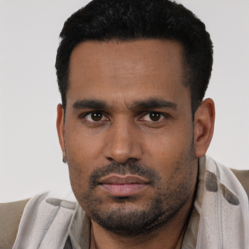 Neutral latino young-adult male with short  black hair and brown eyes