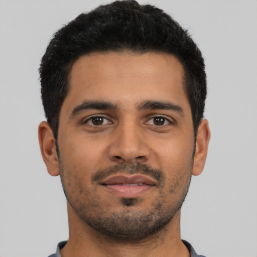 Neutral latino young-adult male with short  black hair and brown eyes
