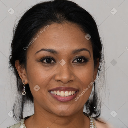 Joyful black young-adult female with medium  black hair and brown eyes