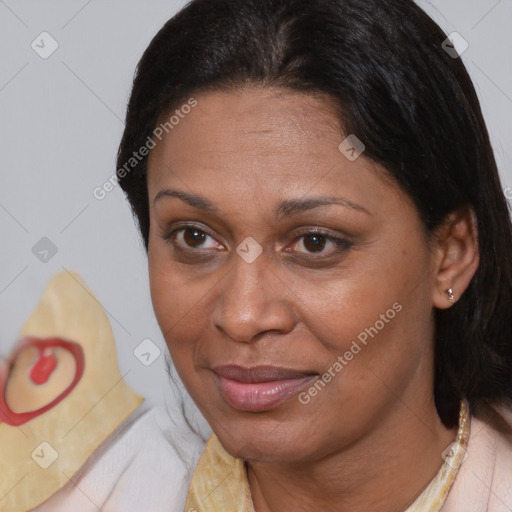 Joyful white adult female with short  brown hair and brown eyes