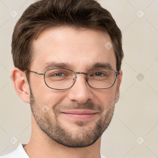 Joyful white adult male with short  brown hair and grey eyes