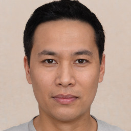 Neutral asian young-adult male with short  black hair and brown eyes