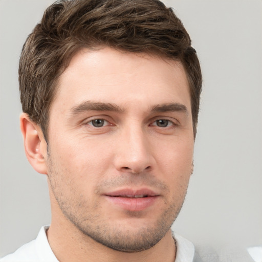 Neutral white young-adult male with short  brown hair and brown eyes