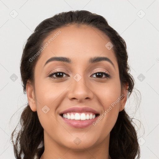 Joyful white young-adult female with long  brown hair and brown eyes