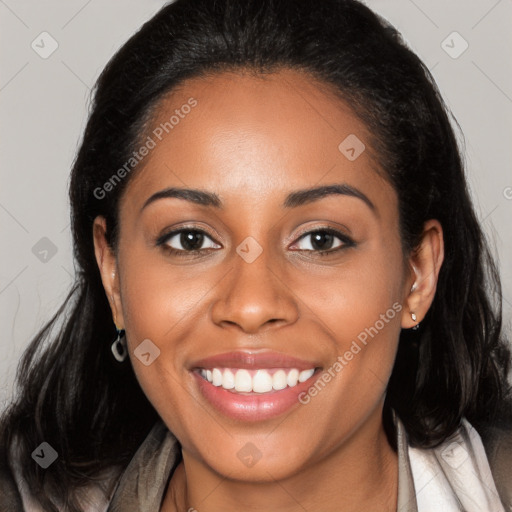 Joyful latino young-adult female with long  brown hair and brown eyes