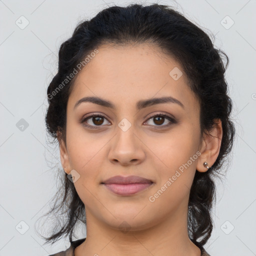 Joyful latino young-adult female with medium  brown hair and brown eyes