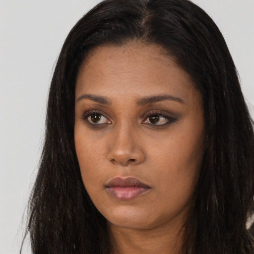 Neutral asian young-adult female with long  brown hair and brown eyes