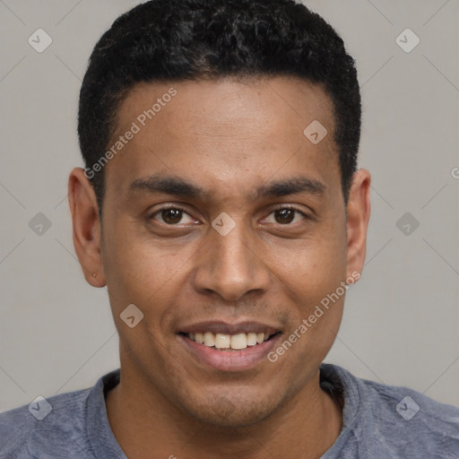 Joyful latino young-adult male with short  brown hair and brown eyes