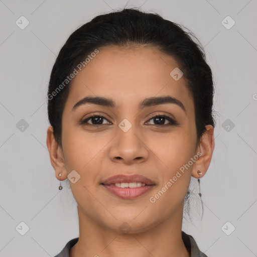 Joyful latino young-adult female with long  brown hair and brown eyes