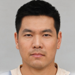 Neutral asian young-adult male with short  black hair and brown eyes