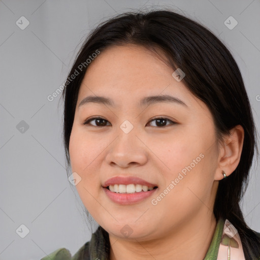 Joyful asian young-adult female with medium  brown hair and brown eyes