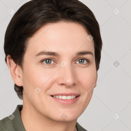 Joyful white young-adult female with short  brown hair and grey eyes