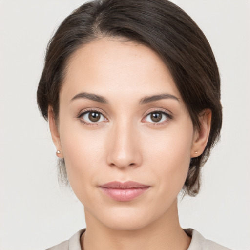 Neutral white young-adult female with medium  brown hair and brown eyes