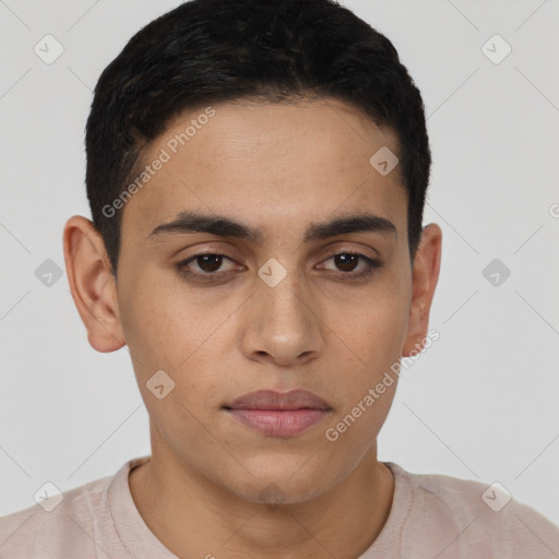 Joyful latino young-adult male with short  brown hair and brown eyes