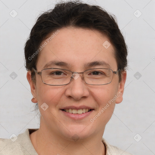 Joyful white adult female with short  brown hair and brown eyes