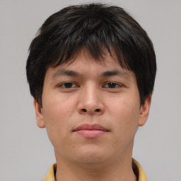 Neutral asian young-adult male with short  brown hair and brown eyes