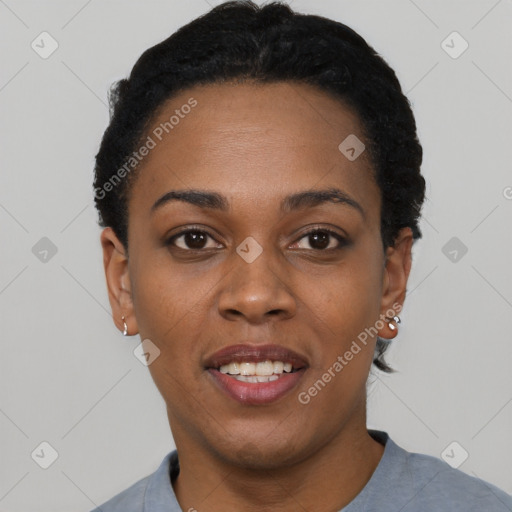 Joyful black young-adult female with short  black hair and brown eyes