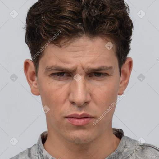 Joyful white adult male with short  brown hair and grey eyes