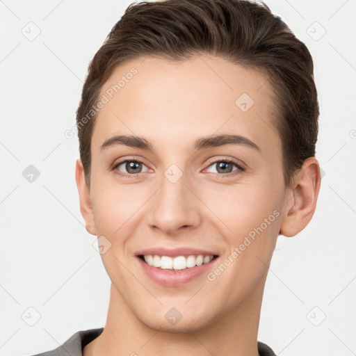 Joyful white young-adult female with short  brown hair and brown eyes