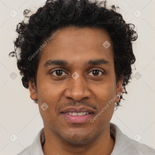 Joyful black young-adult male with short  brown hair and brown eyes