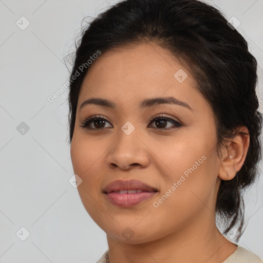 Joyful latino young-adult female with medium  black hair and brown eyes