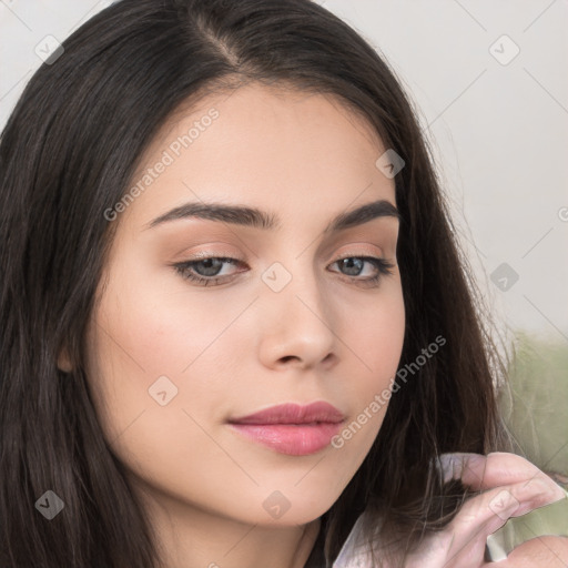 Neutral white young-adult female with long  brown hair and brown eyes